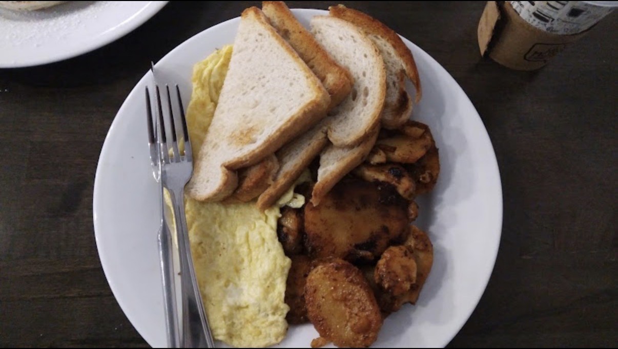 Eggs, toast and home fries breakfast plate